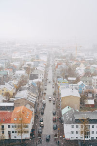 High angle view of street amidst buildings in city