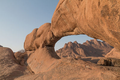 Rock formation against clear sky