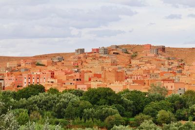 Buildings in city against sky