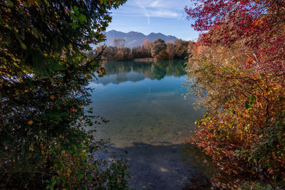 Scenic view of lake against sky during autumn