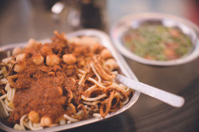 Close-up of noodles in bowl on table