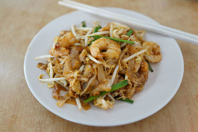 Close-up of prawns in plate on table