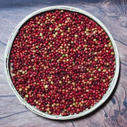 High angle view of strawberries in bowl on table