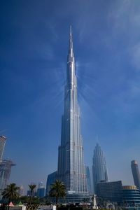 Low angle view of buildings in city against sky