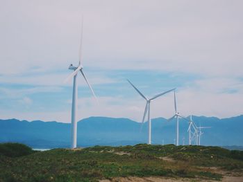 Wind turbines on field