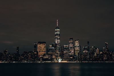 Illuminated buildings in city at night