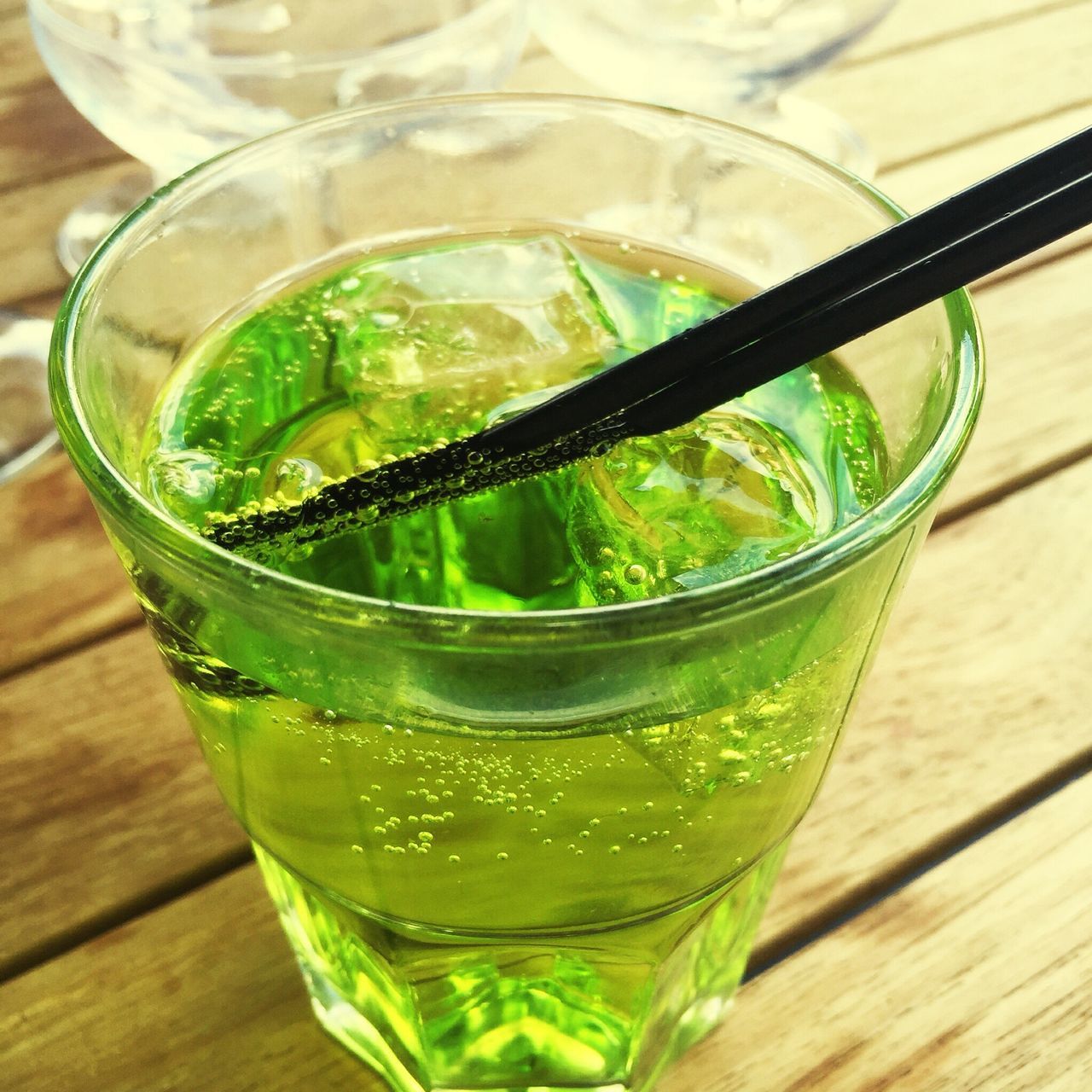 drink, food and drink, drinking glass, refreshment, table, freshness, still life, indoors, glass - material, close-up, drinking straw, alcohol, transparent, glass, ice cube, cocktail, focus on foreground, mint leaf - culinary, juice, healthy eating