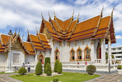 Tourists visiting the marble temple, a major destination in bangkok. thailand now welcomes tourists.