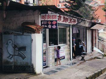 People at entrance of building