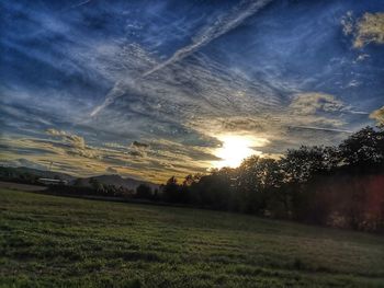Scenic view of landscape against sky during sunset
