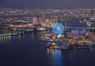 Illuminated buildings in city at night