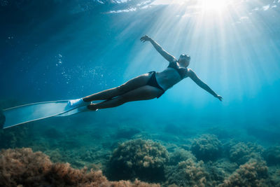 Man swimming in sea