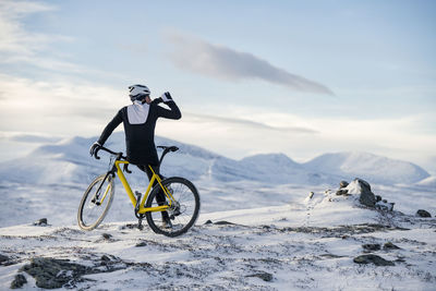 Man cycling at winter