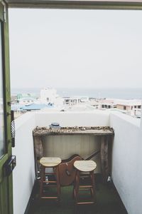 View of deck chairs on beach