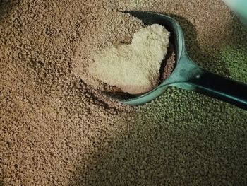 High angle view of bread on sand