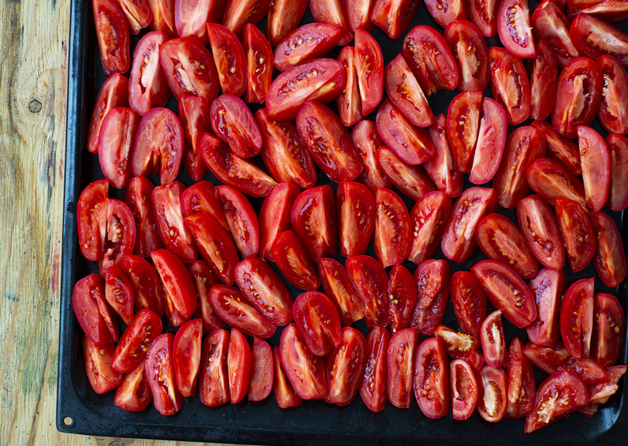 HIGH ANGLE VIEW OF RED CHILI PEPPERS AT MARKET STALL