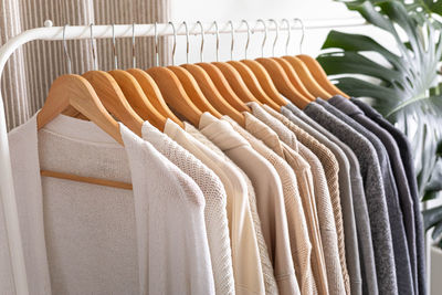 Close-up of clothes hanging in store