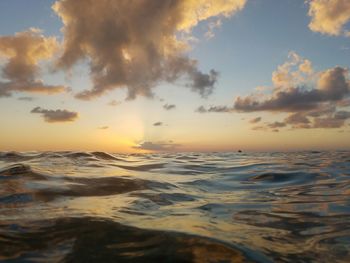 Scenic view of sea against sky at sunset