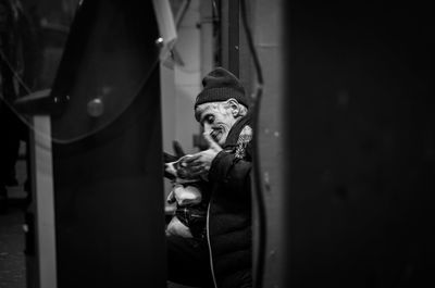 Portrait of young man looking at camera