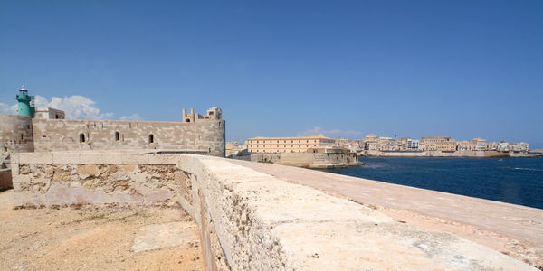 View of fort against blue sky