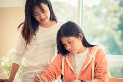 Portrait of mother and daughter