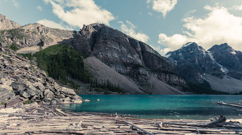 Scenic view of mountains against cloudy sky