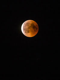 Scenic view of moon against sky at night