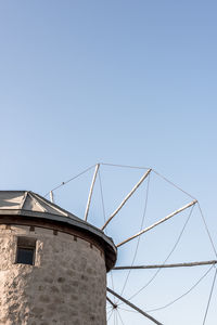 Low angle view of water tower against sky