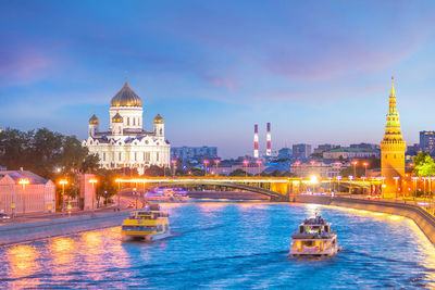 View of illuminated buildings in city