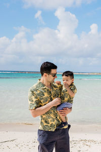 Father and son on the beach