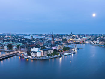 City at sea at dusk