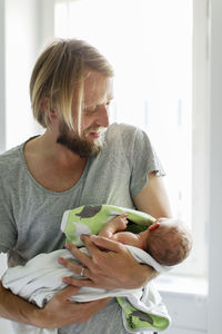 Father with newborn baby