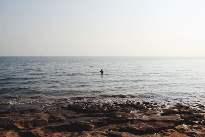 Scenic view of sea against clear sky