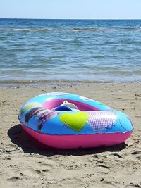 Multi colored umbrella on beach