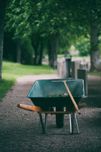 Chairs and table against trees