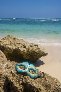 Blue sea water on rocks