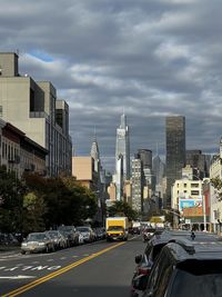 Buildings in city against sky