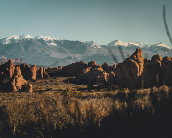 Panoramic view of snowcapped mountains against sky