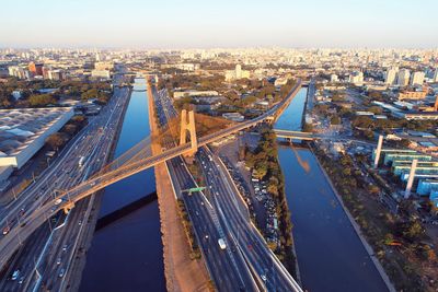 High angle view of city and buildings against sky