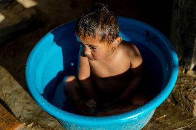 High angle view of boy in swimming pool