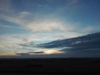 Scenic view of silhouette landscape against sky during sunset