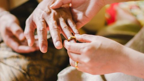 Close-up of woman holding hands