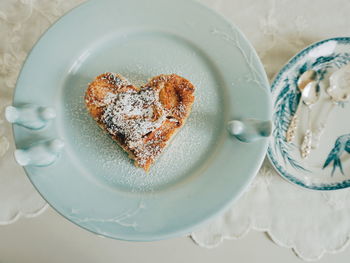 Close-up of heart shape cake in plate