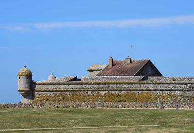 Historic building against blue sky