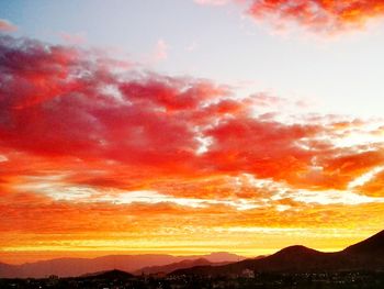 Scenic view of mountains against sky during sunset