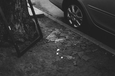 High angle view of abandoned car on street