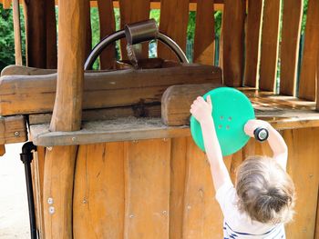 Rear view of playing at park