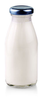 Close-up of glass bottle against white background