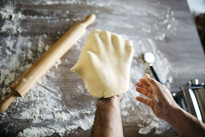 Close-up of hand holding ice cream