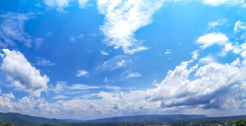 Low angle view of clouds over blue sky